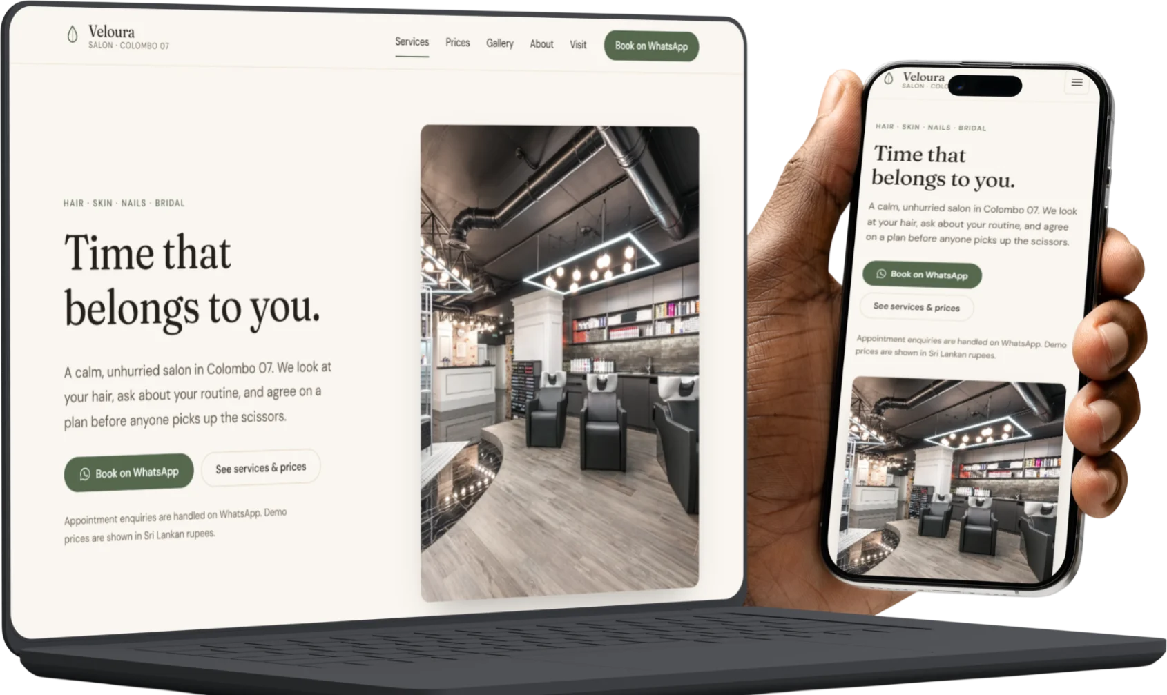 The Veloura Salon concept site shown twice: filling a laptop screen, and on a phone held in a hand, with the same page reflowed for the smaller screen.